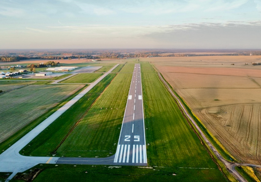 Aerial view of the newly repaved Runway 25 at Lorain County Regional Airport at sunset