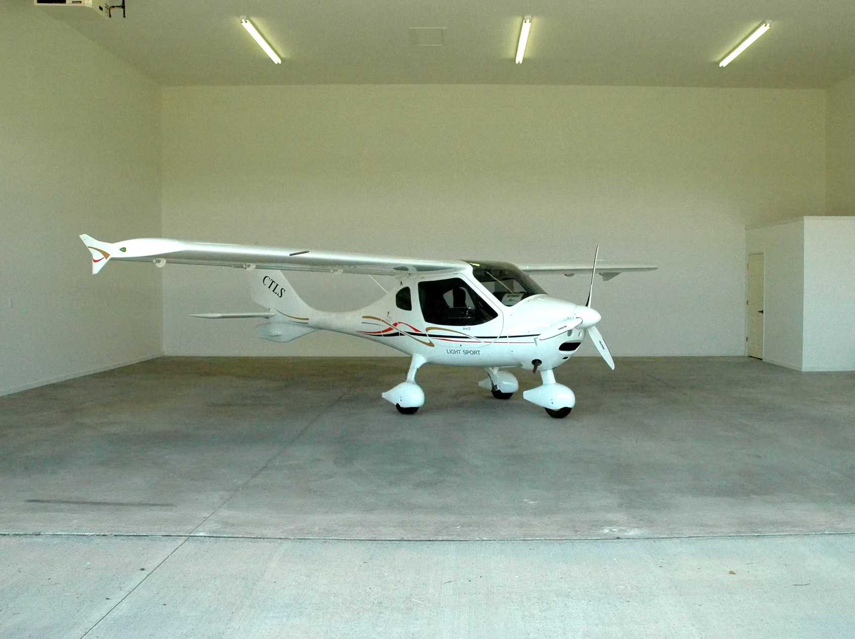 Light sport aircraft inside the spacious MRK Aviation hangar