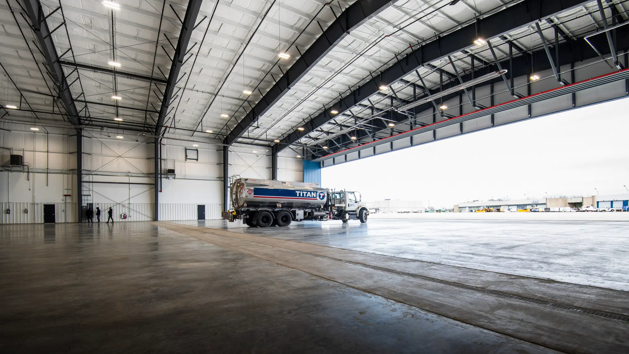 Interior of JETS South Hangar with Titan fuel truck and aircraft door open