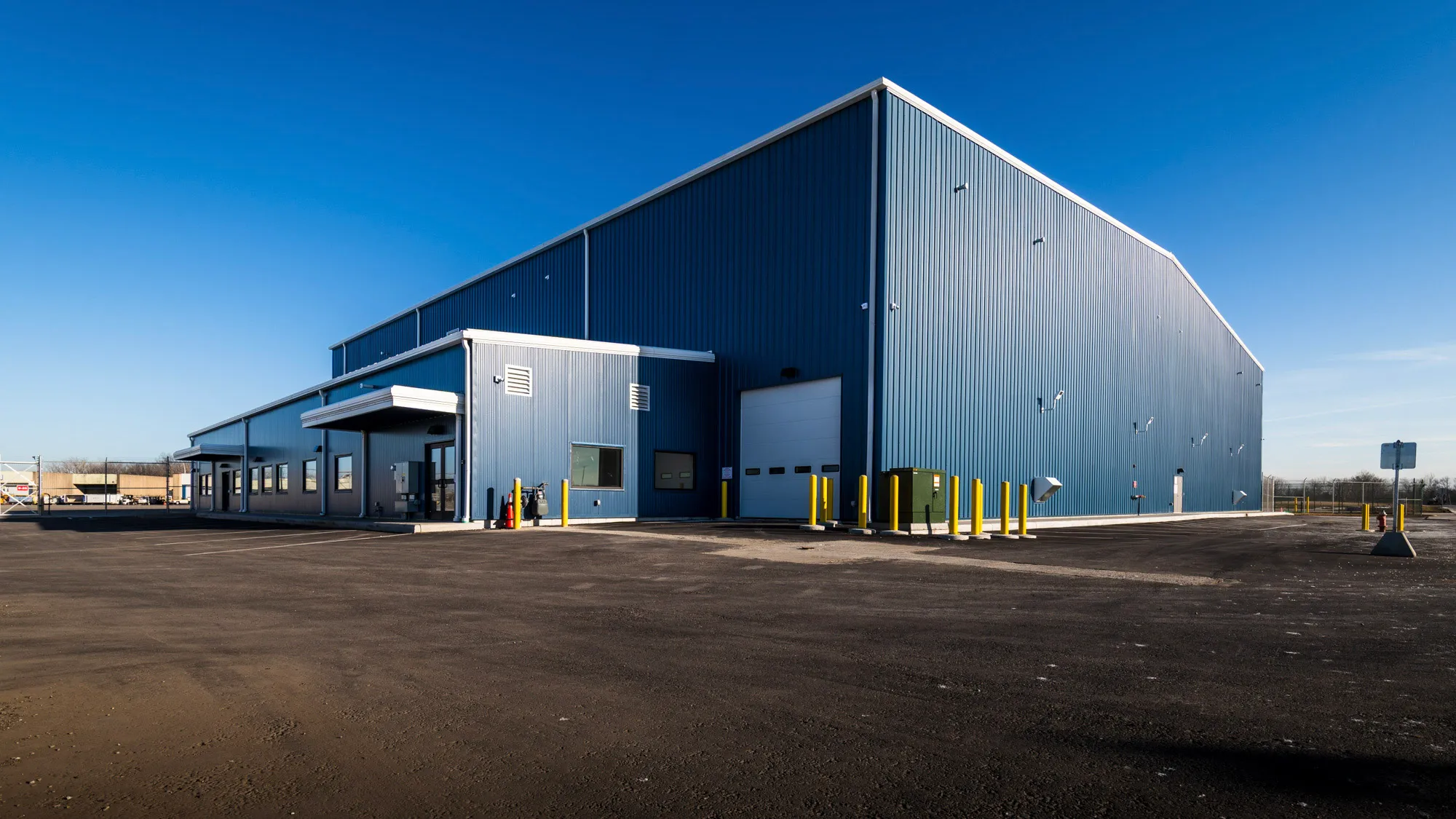 JETS South Hangar exterior at Cleveland Hopkins — purpose-built corporate hangar with 29-foot doors
